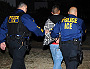 ICE officers arresting suspected illegal aliens during Operation Return to Sender in Los Angeles