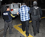 ICE officers arresting suspected illegal aliens during Operation Return to Sender in Los Angeles