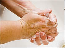 Photo of hand washing.
