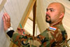 Croatian Senior Chief Ivan Orlandini makes a briefing schedule during Exercise Combined Endeavor 2007 at Lager Aulenbach, Baumholder, Germany, April 30, 2007. The exercise was the largest security cooperation and communications and information systems military exercise in the world, with participation from more than 1,200 military and civilian personnel from 42 countries and two multi-national organizations. U.S. Air Force photo by Senior Airman Dayton Mitchell