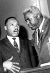 Robinson was moved by Martin Luther King, Jr., and his Southern Christian Leadership Conference, lending his presence and raising money for King and his cause. Photo Credit: Corbis-Bettmann Archive