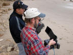 Maurice Hill (MINT) assists with remote helicopter photography.