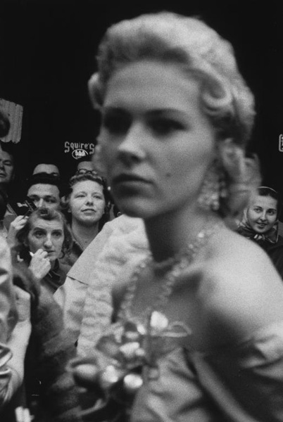 Image: Robert Frank (American, born Switzerland, 1924) Movie premiere—Hollywood, 1955 gelatin silver print Overall: 25.5 x 17.3 cm (10 1/16 x 6 13/16 in.); Overall: 50.8 x 40.6 cm (20 x 16 in.); Overall: 35.4 x 27.9 cm (13 15/16 x 11 in.) The Museum of Modern Art, New York, Purchase, 2002 Photograph © Robert Frank, from The Americans