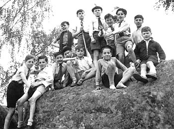 Maurice Schlosser, one of the hidden boys, with his classmates on the rocks of Avon. 1943.