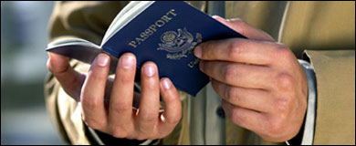 Photo: Hands holding a passport