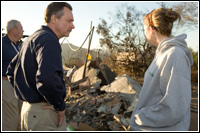 FEMA Director, Chief Paulison and FEMA officials listen to a Rancho Bernardo resident who lost her home in the recent Southern California fires. Andrea Booher/FEMA