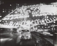 image: Ted Croner, American, born 1922, Times Square Montage, c. 1947, gelatin silver print, printed c. 1970, © Ted Croner Estate, Courtesy Howard Greenberg Gallery, NYC