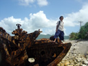 Vessel debris field on Aunuu, American Samoa - children playing on debris