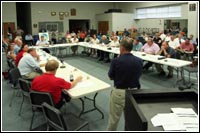 Federal Coordinating Officer Bill Vogel attended today's 'Rebuilding Iowa' meeting at Wapello High School to update community leaders on FEMA's progress in providing temporary housing for displaced Iowans. Governor Culver started the 'Rebuilding Iowa Office' to hasten recovery after a series of storms in May and June decimated the state. Photo by Greg Henshall / FEMA