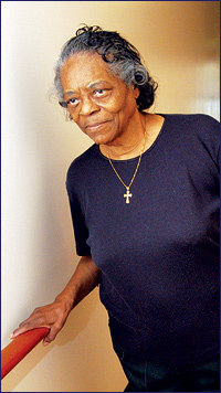 Older African American woman in a hallway
