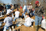 Members of the community fill sandbags for an operation going on near a levee in an area called Sandhill. Jocelyn Augustino/FEMA