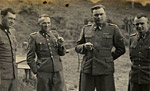 Left to right: Dr. Josef Mengele, Rudolf Höss, Josef Kramer, and an unidentified officer.