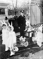 Children dressed as bunnies with cart