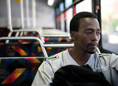 Man sitting on a bus