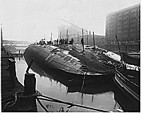 The Eastland (upside down) on Chicago River, 1915