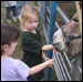 Photo: Children at a petting zoo.