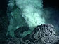 Lava erupts onto the seafloor at NW Rota-1, creating a cloudy, extremely acidic plume.