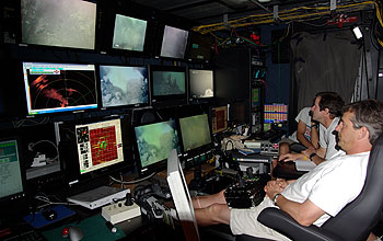 Scientists track Jason's progress on the sea-floor from a control room aboard ship.