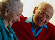 Photo of elderly couple laughing