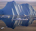 Photo of iceberg and its reflection