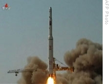 his video grab released on April 7, 2009 by North Korean Television shows a three-stage white rocket, bearing the word 