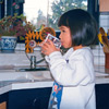  [Photo: Child drinking water.] 