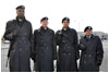 Sgt. 1st Class Anthony Gardner, Sgt. 1st Class Robert Hull, Spc. Angela Hunter and Staff Sgt. Jose Martinez, all with the District of Columbia Army National Guard, stand by in the Pentagon parking lot before marching in the inaugural parade, Jan. 20, 2009. U.S. Army photo by Staff Sgt. Jim Greenhill