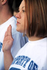 A recruit takes the oath of enlistment. Defense Dept. photo by Samantha L. Quigley