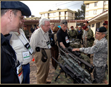 Colombian special forces members display and explain military hardware to participants of the 75th Joint Civilian Orientation Conference outside Bogota, Colombia, April 22, 2008. 
