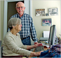 ORCATECH study participants at home, with an infrared motion sensor visible on the wall behind them