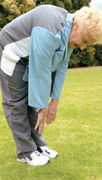 Photo of an elderly woman stretching