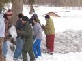 Residents work in the snow to build a sand bag wall in Fargo, North Dakota