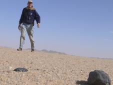 On Feb. 28, 2009, Peter Jenniskens, meteor astronomer at NASA Ames Research Center and the SETI Institute Mountain View, Calif., found his first 2008TC3 meteorite, which broke into two pieces when it landed.