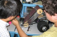 two students working on their robot