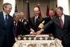 (From left to right) U.S. Rep. Chet Edwards of Texas, Sen. Daniel Akaka of Hawaii, Chief of Staff of the Army Gen. George Casey, Secretary of the Army Pete Geren, Sgt. Maj. of the Army Kenneth Preston and Sen. James Inhofe of Oklahoma ceremoniously cut the Army's birthday cake on Capitol Hill in Washington, June 10, 2008.
