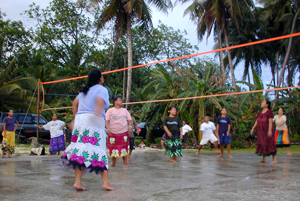 Women play volleyball in Kosrae, Micronesia April 9, 2004. [© AP Images]