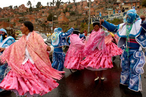 Bolivians in carnival costumes participate in street party, La Paz, Bolivia, February. 18, 2007. [© AP Images]