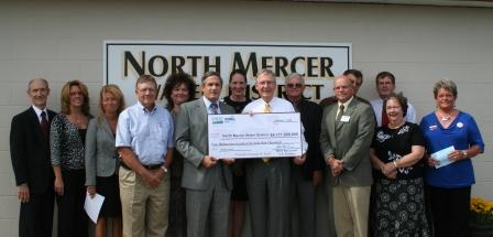 Senator Mitch McConnell helps deliver a Rural Developemnt grant to North Mercer Water District