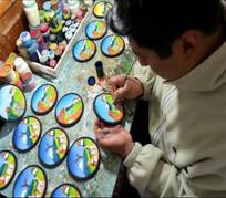 Photo of an Equadorian Artist helped by USIAD's Microfinance Program
