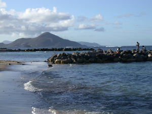 Jetty at Nisbet Beach on the island of Nevis, January 25, 2003. [© AP Images]