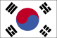 Flag of South Korea is white with a red (top) and blue yin-yang symbol in the center; there is a different black trigram from the ancient I Ching (Book of Changes) in each corner of the white field.