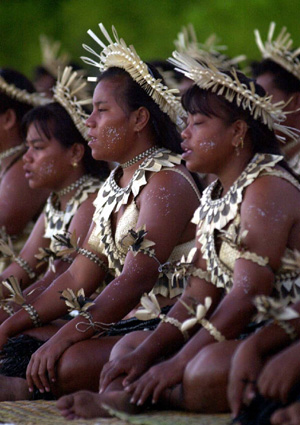 Kiribati dancers participate in New Year's ceremony on Millennium Island, Kiribati, Saturday, January 1, 2000. [© AP Images]