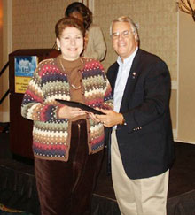 IG acknowledges OIG staff's federal service. Shown here Joan Green, Atlanta OIG, with IG Gianni.