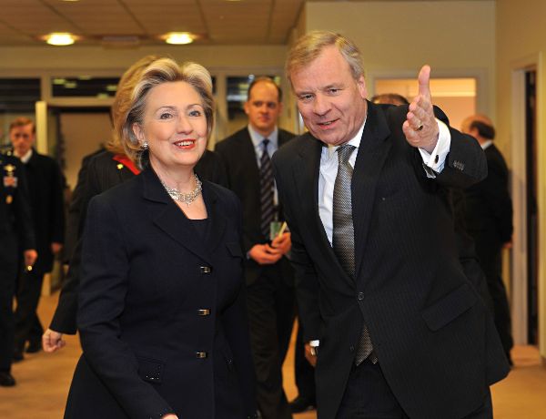 Secretary Clinton being greeted by NATO Secretary General Jaap de Hoop Scheffer at the Meetings of NATO Foreign Ministers in Brussels.