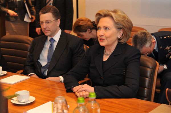 NATO Permanent Representative for the United States Kurt  Volkner and Secretary Clinton at the Meetings of NATO Foreign Ministers in Brussels.
