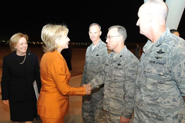 Secretary of State Hillary Rodham Clinton arrives in Kuwait on April 24, 2009 and greets members of the Office of Military Cooperation - Kuwait along with U.S. Ambassador to Kuwait Deborah K. Jones.