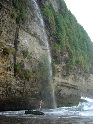 A visitor bathes on Secret Beach near Portsmouth, Dominica, October 2006. [© AP Images]