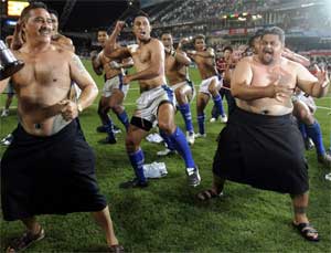 Samoan players perform celebratory dance after winning rugby match in Hong Kong, April 1, 2007. [© AP Images]