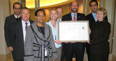 Members of the International Trade Administration’s Trade Remedy Compliance Staff celebrate their Department of Commerce Silver Medal Award. The team earned the award for its efforts to address trade remedy actions taken by foreign governments in order to support U.S. industry efforts to compete on a level playing field in the international marketplace. (U.S. Department of Commerce photo)
