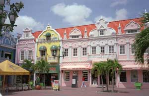 Colorful storefronts line the streets of Aruba's capital, Oranjestad. October 2003. [© AP Images]